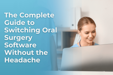 A dental assistant sitting behind a computer, focused on her screen, with dental software open. Representing efficient and confident use of practice technology.