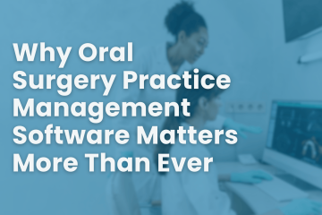 Two oral surgery professionals reviewing patient data on a computer, illustrating the importance of efficient oral surgery practice management software for streamlined workflows and team collaboration.